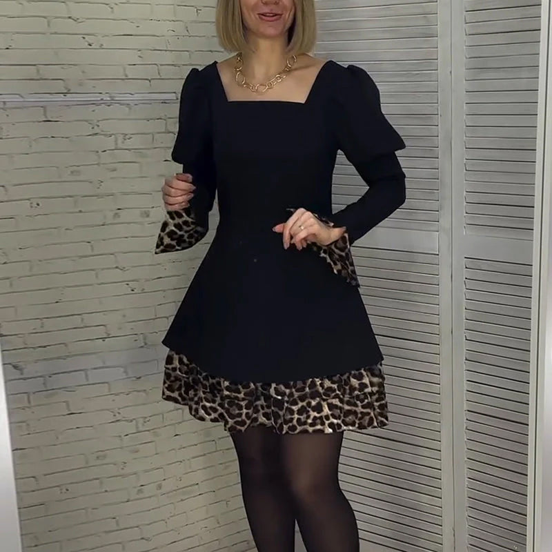 Elegantes Kleid mit Puffärmeln und Leopardenmuster